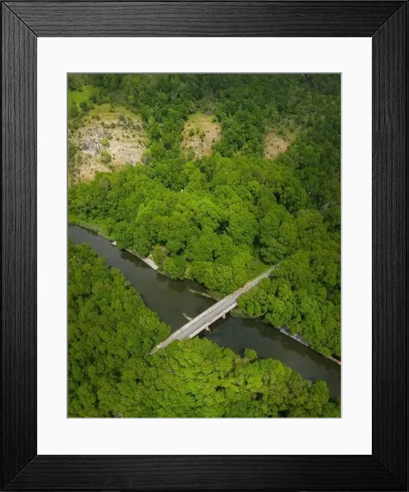 Framed Print : Aerial view to a bridge over the river in the mountain Framed Print : Aerial view to a bridge over the river in the mountain