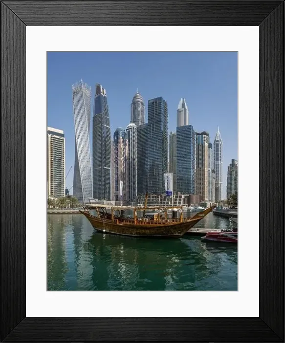 Framed Print : Morning shot of the Dubai Marina skyline along with a docked boat Framed Print : Morning shot of the Dubai Marina skyline along with a docked boat