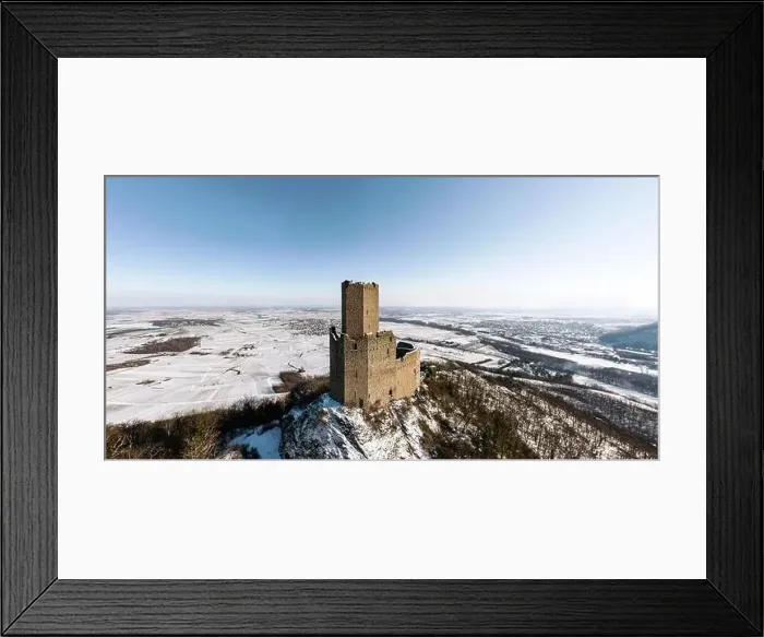 Framed Print : Panoramic view of the Ortenburg castle in the Vosges. Aerial view, drone shooting. Winter, Snow lies on the mountains Framed Print : Panoramic view of the Ortenburg castle in the Vosges. Aerial view, drone shooting. Winter, Snow lies on the mountains