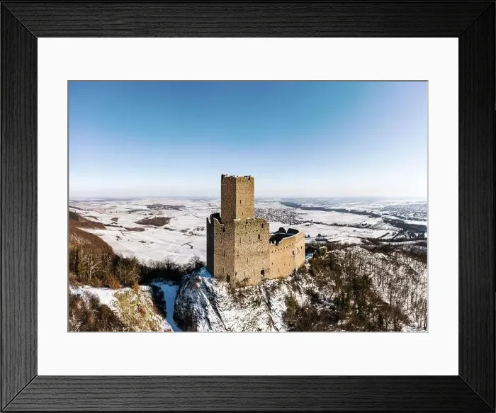 Framed Print : Panoramic view of the Ortenburg castle in the Vosges. Aerial view, drone shooting. Winter, Snow lies on the mountains Framed Print : Panoramic view of the Ortenburg castle in the Vosges. Aerial view, drone shooting. Winter, Snow lies on the mountains