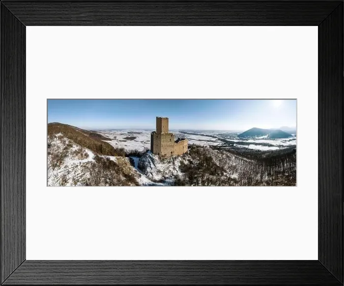 Framed Print : Panoramic view of the Ortenburg castle in the Vosges. Aerial view, drone shooting. Winter, Snow lies on the mountains Framed Print : Panoramic view of the Ortenburg castle in the Vosges. Aerial view, drone shooting. Winter, Snow lies on the mountains