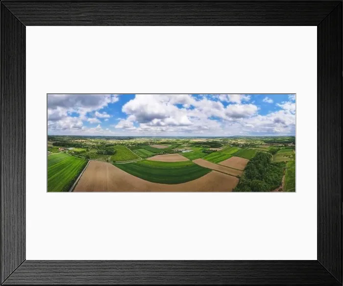 Framed Print : Serbian village and their farm fields in springtime. Aerial drone view of fields in the countryside Framed Print : Serbian village and their farm fields in springtime. Aerial drone view of fields in the countryside