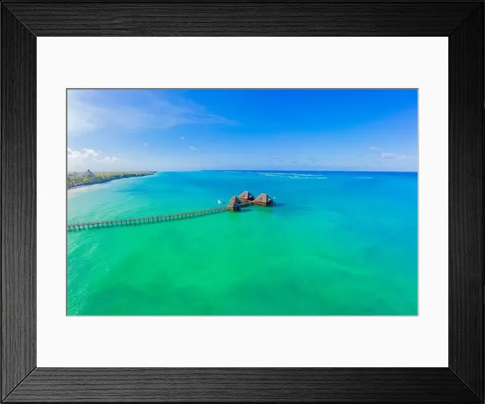 Framed Print : Aerial view of palms on the sandy beach of Indian Ocean at sunny day Framed Print : Aerial view of palms on the sandy beach of Indian Ocean at sunny day