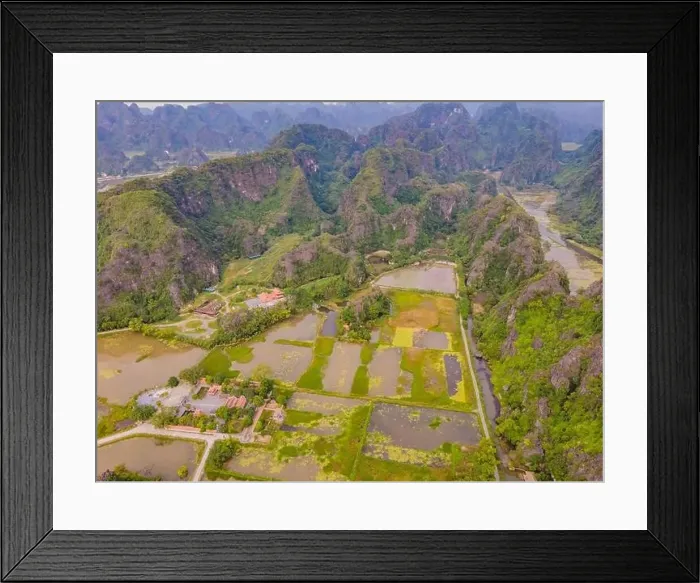 Framed Print : the majestic scenery on Ngo Dong river in Tam Coc Bich Dong view from drone in Ninh Binh province of Viet Nam Framed Print : the majestic scenery on Ngo Dong river in Tam Coc Bich Dong view from drone in Ninh Binh province of Viet Nam