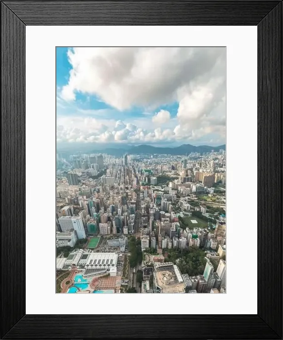 Framed Print : Epic aerial top view of Tsim Sha Tsui, commercial and shopping center of Hong Kong, daytime Framed Print : Epic aerial top view of Tsim Sha Tsui, commercial and shopping center of Hong Kong, daytime