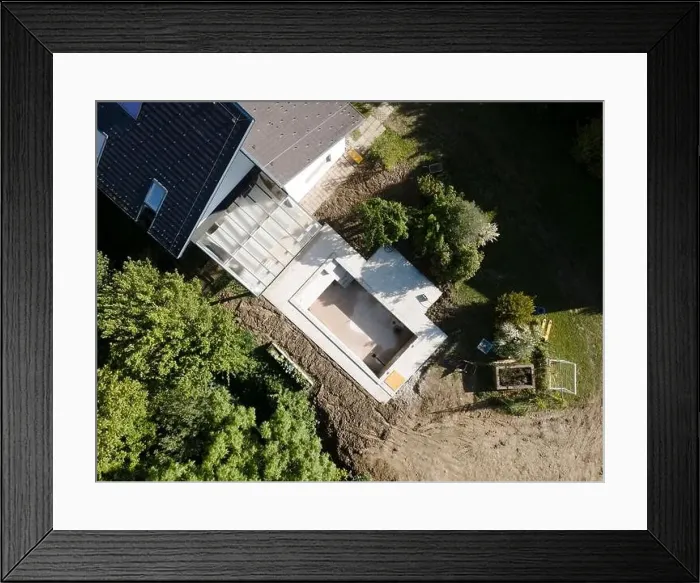 Framed Print : Drone shot of pool construction site in a garden, earth around the pool is already backfilled Framed Print : Drone shot of pool construction site in a garden, earth around the pool is already backfilled