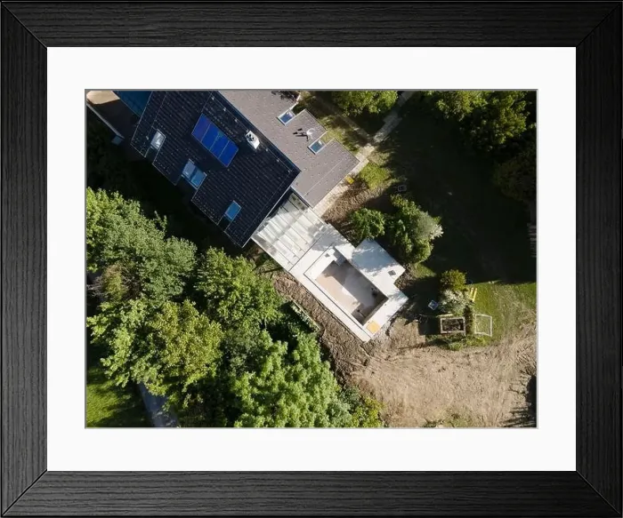 Framed Print : Drone shot of pool construction site in a garden, earth around the pool is already backfilled Framed Print : Drone shot of pool construction site in a garden, earth around the pool is already backfilled