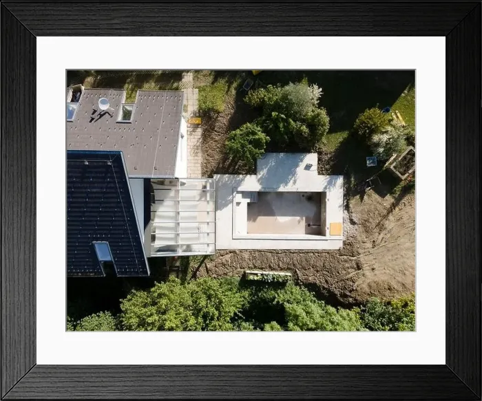 Framed Print : Drone shot of pool construction site in a garden, earth around the pool is already backfilled Framed Print : Drone shot of pool construction site in a garden, earth around the pool is already backfilled