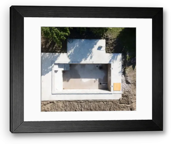 Framed Print : Drone shot of pool construction site in a garden, earth around the pool is already backfilled Framed Print : Drone shot of pool construction site in a garden, earth around the pool is already backfilled