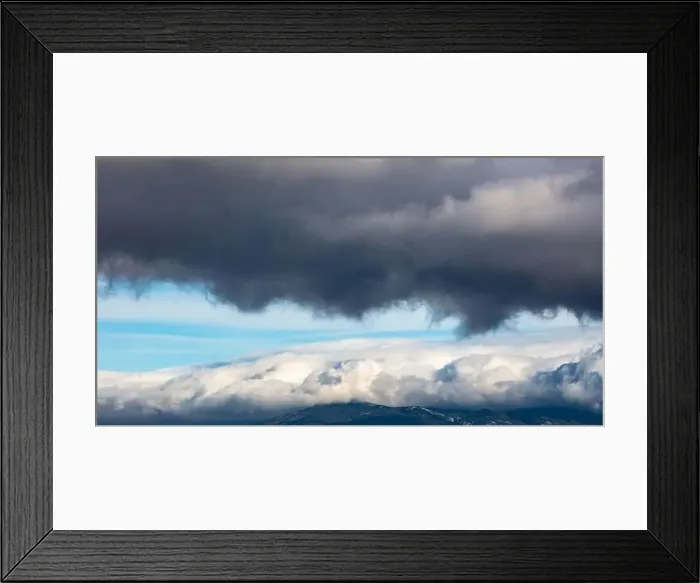 Framed Print : Aerial, drone, dark grey and white clouds on blue sky background
