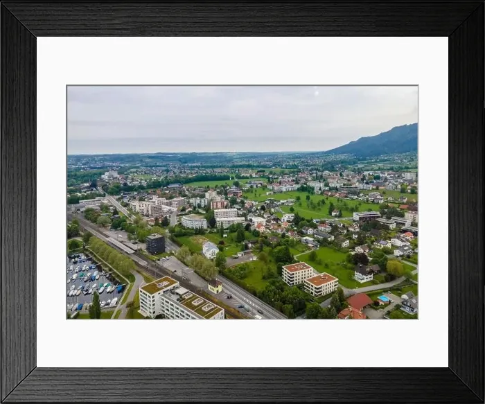 Framed Print : View from a drone to the village Lochau at the Lake Constance, Vorarlberg, Austria Framed Print : View from a drone to the village Lochau at the Lake Constance, Vorarlberg, Austria