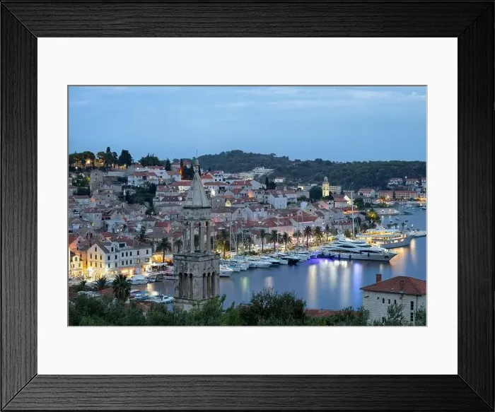 Framed Print : Port of Hvar with the view on old part of the city after sunset Framed Print : Port of Hvar with the view on old part of the city after sunset