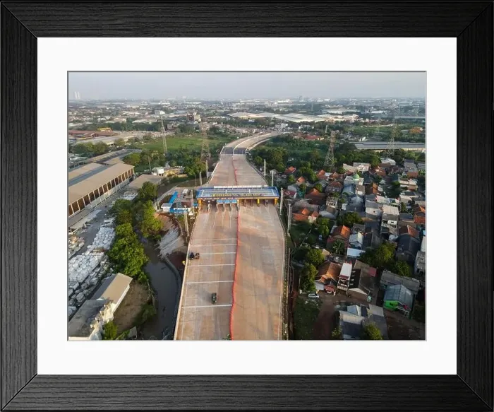 Framed Print : Aerial view on the new road construction site. Bekasi, Indonesia, May 31, 2021 Framed Print : Aerial view on the new road construction site. Bekasi, Indonesia, May 31, 2021