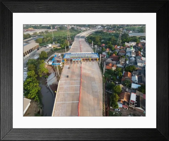 Framed Print : Aerial view on the new road construction site. Bekasi, Indonesia, May 31, 2021 Framed Print : Aerial view on the new road construction site. Bekasi, Indonesia, May 31, 2021