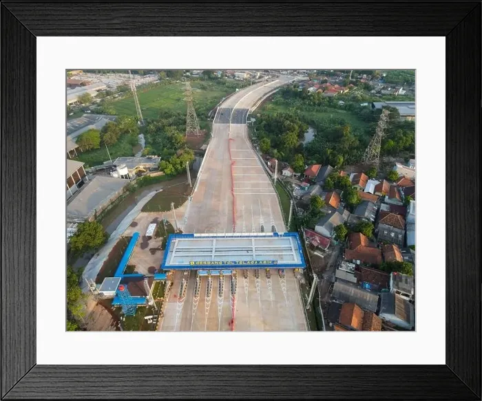 Framed Print : Aerial view on the new road construction site. Bekasi, Indonesia, May 31, 2021 Framed Print : Aerial view on the new road construction site. Bekasi, Indonesia, May 31, 2021