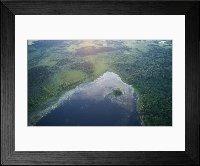 Framed Print : Small pond aerial drone view with island in sunset light Framed Print : Small pond aerial drone view with island in sunset light