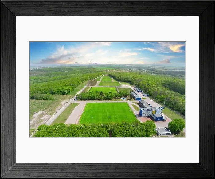 Framed Print : Training soccer fields with green grass in summer forest. View from above Framed Print : Training soccer fields with green grass in summer forest. View from above
