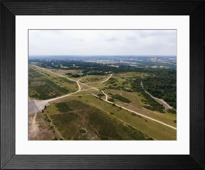 Framed Print : Runway and control tower at Greenham Common overlooking Newbury Racecourse and town in distance Framed Print : Runway and control tower at Greenham Common overlooking Newbury Racecourse and town in distance