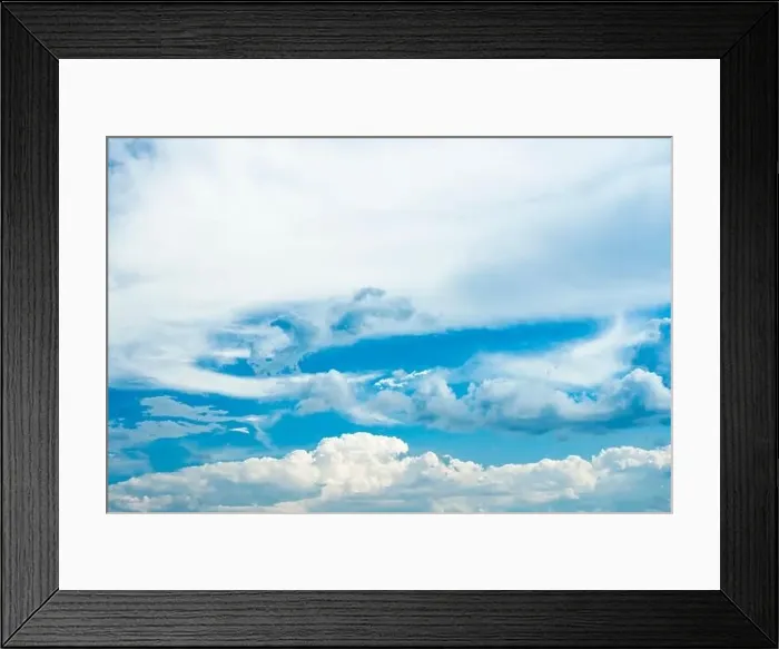 Framed Print : Stunning view of a blue sky with some fluffy clouds. Aerial shoot, natural background with copy space Framed Print : Stunning view of a blue sky with some fluffy clouds. Aerial shoot, natural background with copy space