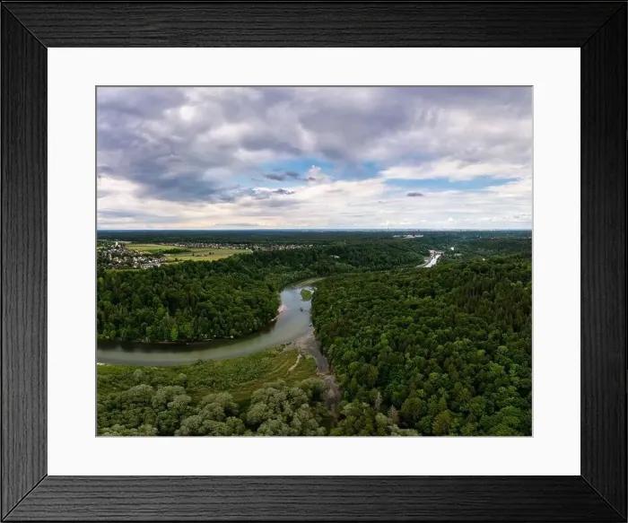 Framed Print : Bending river surrounded by vivid green tees