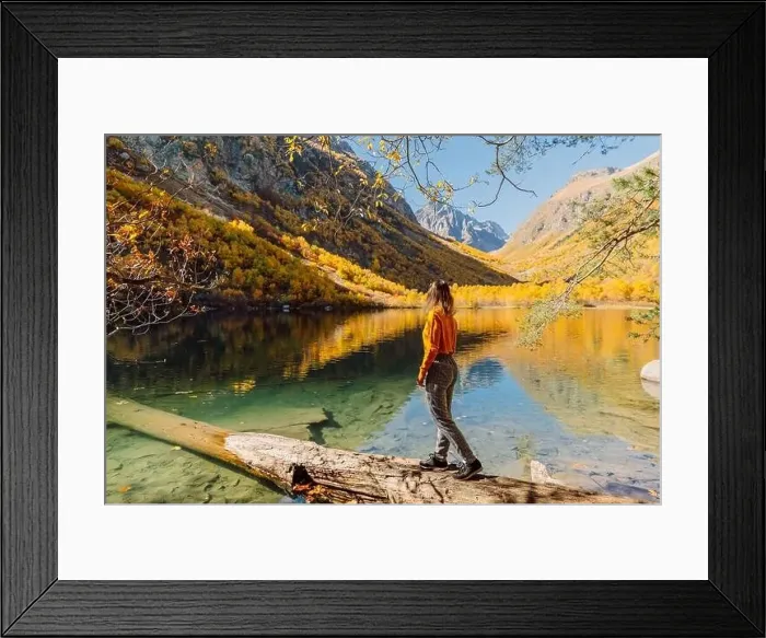 Framed Print : Woman at crystal lake in the autumnal mountains. Mountain lake and traveller woman Framed Print : Woman at crystal lake in the autumnal mountains. Mountain lake and traveller woman