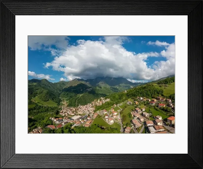 Framed Print : Drone aerial view to the Seriana valley and Orobie Alps with big cloud and blue sky Framed Print : Drone aerial view to the Seriana valley and Orobie Alps with big cloud and blue sky