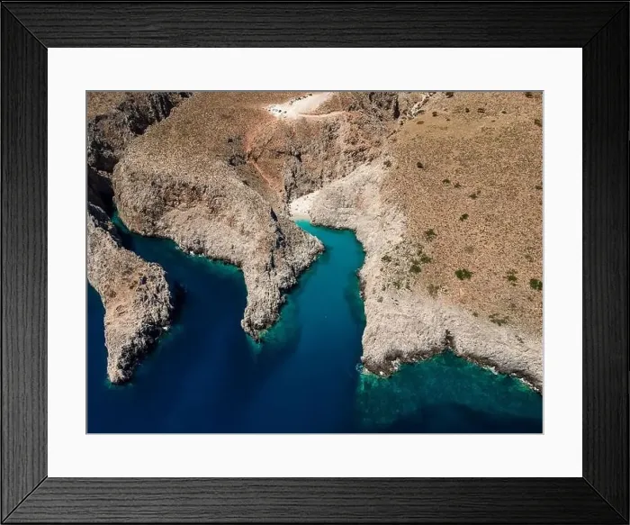 Framed Print : Aerial top view by drone of beach of Seitan Limania in bay with turquoise water and an unusual shape in Akrotiri, Crete Framed Print : Aerial top view by drone of beach of Seitan Limania in bay with turquoise water and an unusual shape in Akrotiri, Crete