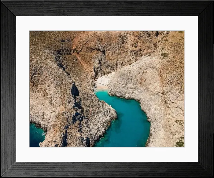 Framed Print : Aerial top view by drone of beach of Seitan Limania in bay with turquoise water and an unusual shape in Akrotiri, Crete Framed Print : Aerial top view by drone of beach of Seitan Limania in bay with turquoise water and an unusual shape in Akrotiri, Crete