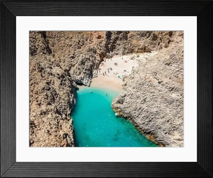 Framed Print : Aerial top view by drone of beach of Seitan Limania in bay with turquoise water and an unusual shape in Akrotiri, Crete Framed Print : Aerial top view by drone of beach of Seitan Limania in bay with turquoise water and an unusual shape in Akrotiri, Crete