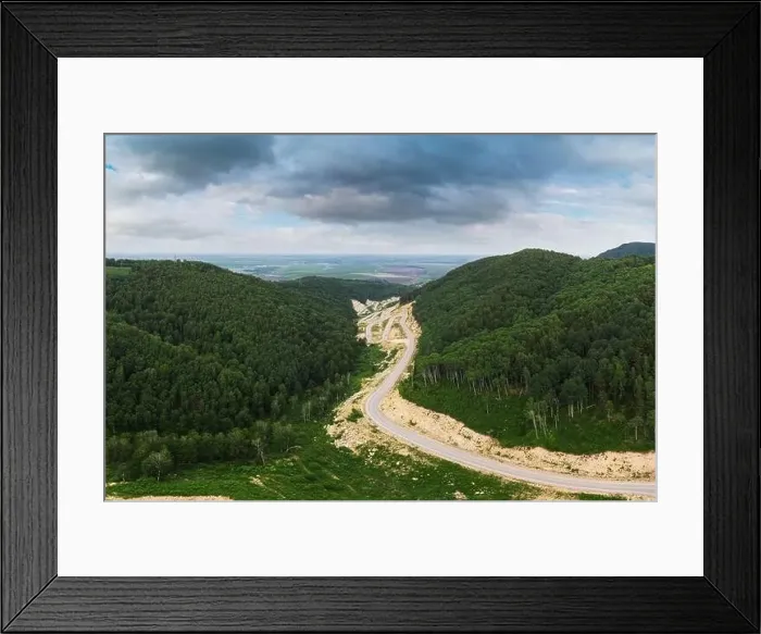 Framed Print : Aerial top vew of winding road in the mountains Framed Print : Aerial top vew of winding road in the mountains