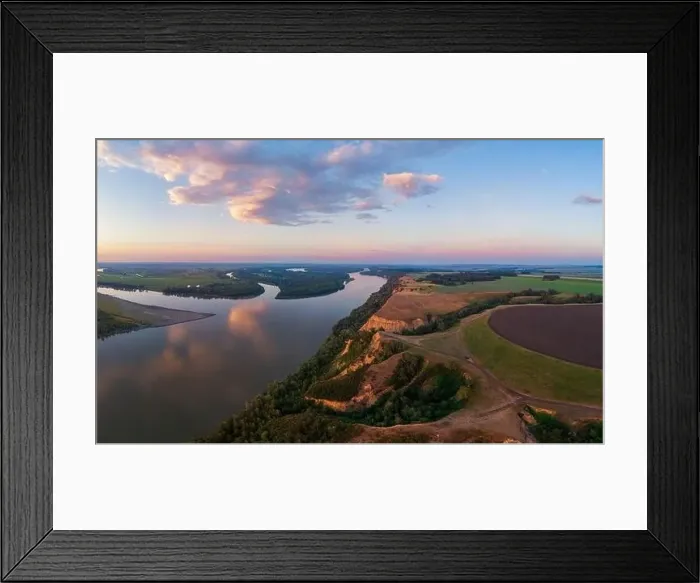 Framed Print : Aerial drone view of river landscape in sunny summer evening Framed Print : Aerial drone view of river landscape in sunny summer evening