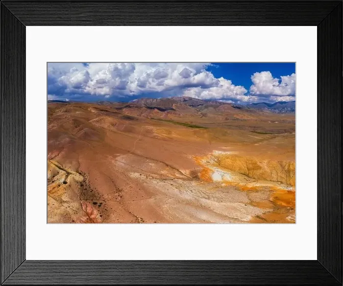 Framed Print : Aerial shot of the textured yellow nad red mountains resembling the surface of Mars Framed Print : Aerial shot of the textured yellow nad red mountains resembling the surface of Mars