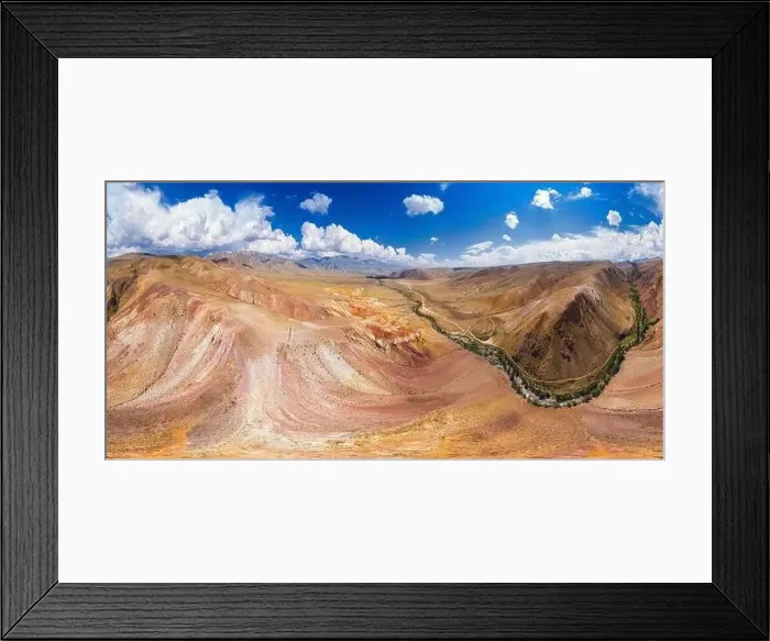 Framed Print : Aerial shot of the textured yellow nad red mountains resembling the surface of Mars Framed Print : Aerial shot of the textured yellow nad red mountains resembling the surface of Mars