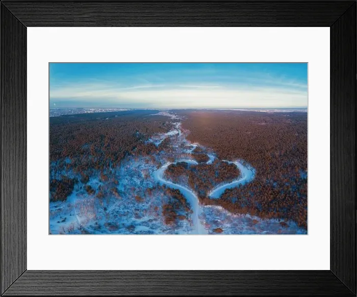 Framed Print : Aerial view of a heart shaped winter forest