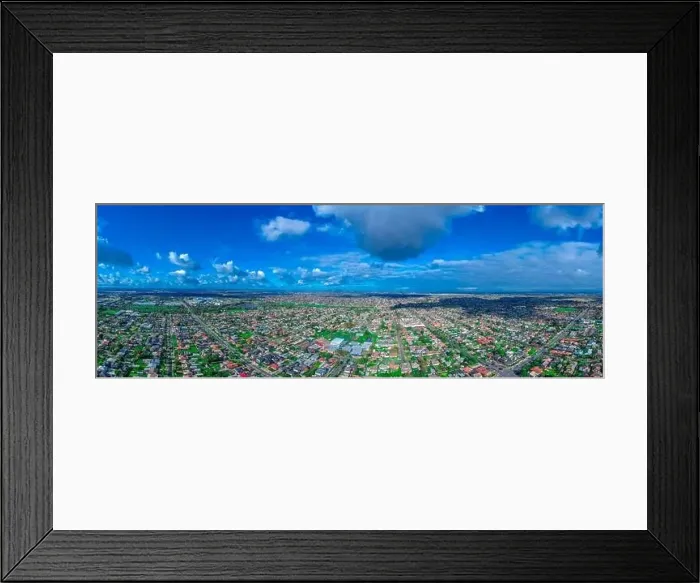 Framed Print : Panoramic aerial Drone view of Melbournes suburbs and CBD looking down at Houses roads and Parks Victoria Australia Framed Print : Panoramic aerial Drone view of Melbournes suburbs and CBD looking down at Houses roads and Parks Victoria Australia