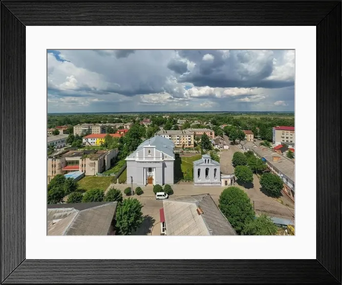 Framed Print : Dubno, Ukraine - June 7, 2021: Aerial view on Church of Saint John Nepomuk in Dubno, Ukraine from drone Framed Print : Dubno, Ukraine - June 7, 2021: Aerial view on Church of Saint John Nepomuk in Dubno, Ukraine from drone