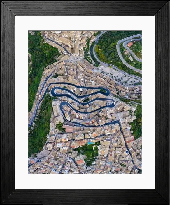 Framed Print : Aerial view of the old town of Ragusa Ibla and a winding road Framed Print : Aerial view of the old town of Ragusa Ibla and a winding road