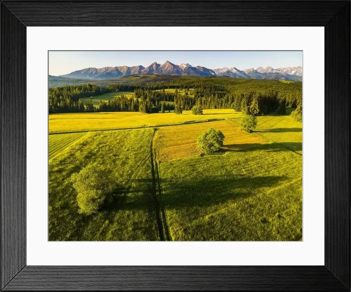 Framed Print : Aerial Drone View of Lapszanka Meadow and High Tatras in Poland Framed Print : Aerial Drone View of Lapszanka Meadow and High Tatras in Poland