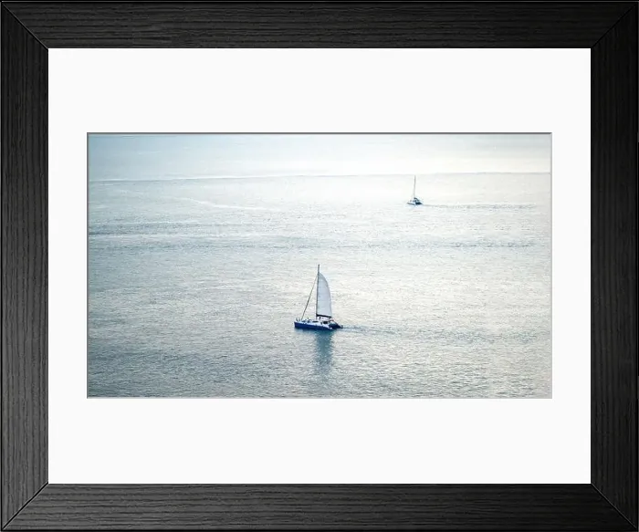 Framed Print : minimal Sailboat Yacht is saling on the calm sea Framed Print : minimal Sailboat Yacht is saling on the calm sea