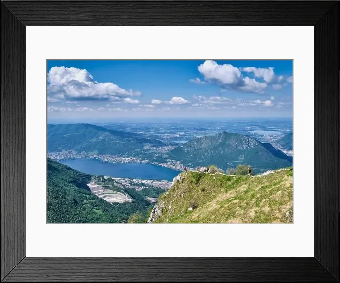 Framed Print : Men walking on mountain peak with beautiful panorama in background of Lake Como - Piani d'Erna, Lombardy, Italy Framed Print : Men walking on mountain peak with beautiful panorama in background of Lake Como - Piani d'Erna, Lombardy, Italy