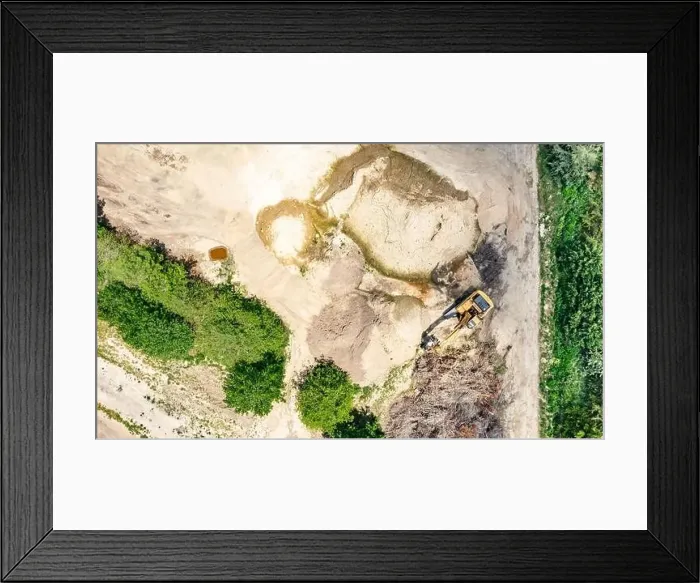 Framed Print : aerial view of an excavator in a landscape Framed Print : aerial view of an excavator in a landscape