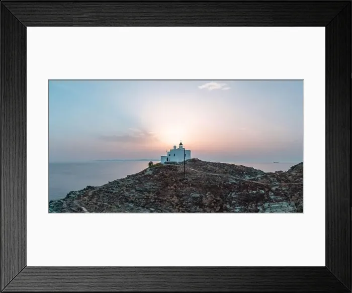Framed Print : Lighthouse and Agios Nikolaos church on a rocky cape Framed Print : Lighthouse and Agios Nikolaos church on a rocky cape