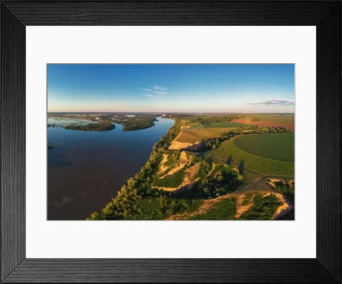 Framed Print : Aerial drone view of river landscape in sunny summer evening Framed Print : Aerial drone view of river landscape in sunny summer evening