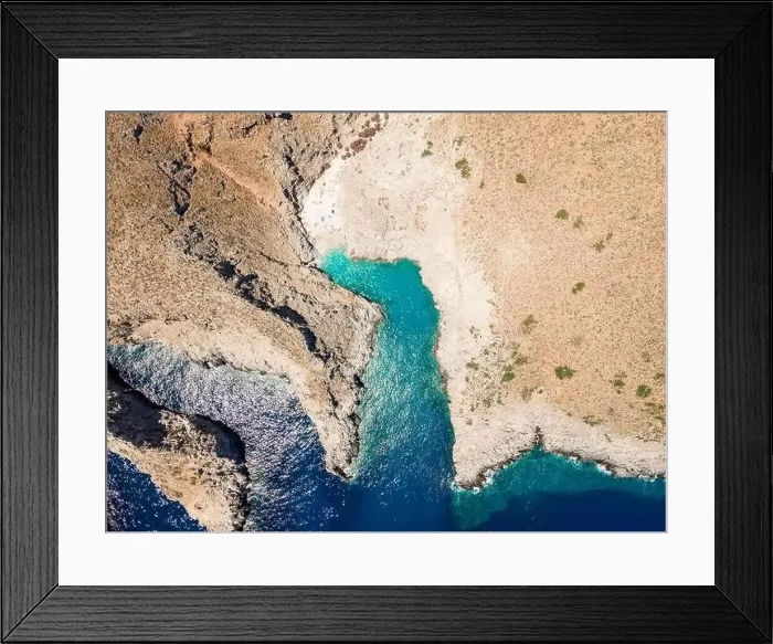 Framed Print : Aerial top view by drone of Seitan limania or Agiou Stefanou beach with turquoise water in Chania Framed Print : Aerial top view by drone of Seitan limania or Agiou Stefanou beach with turquoise water in Chania