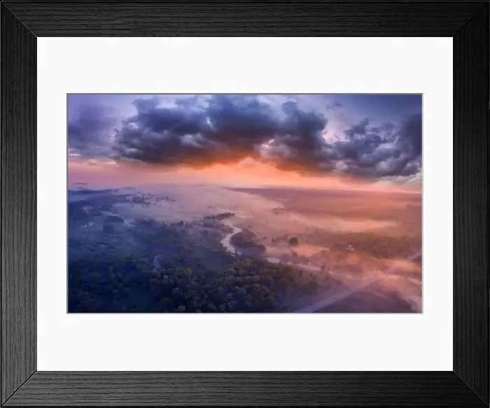 Framed Print : Drone view of the bright dawn over the highway overpass, forest and misty meadow