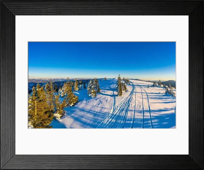 Framed Print : Magical winter panorama of beautiful snowy slopes at a ski resort in Europe on a sunny Framed Print : Magical winter panorama of beautiful snowy slopes at a ski resort in Europe on a sunny