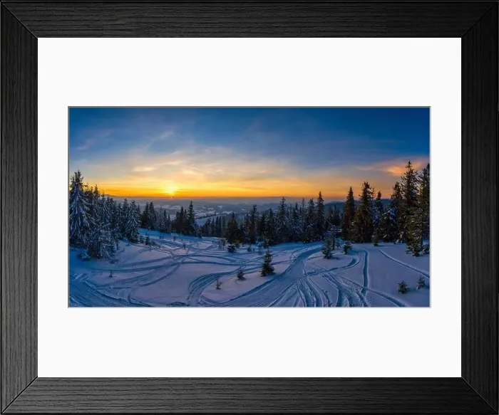 Framed Print : Fabulous snow-covered panorama of spruce trees growing on the mountain slopes in winter in cloudy foggy weather