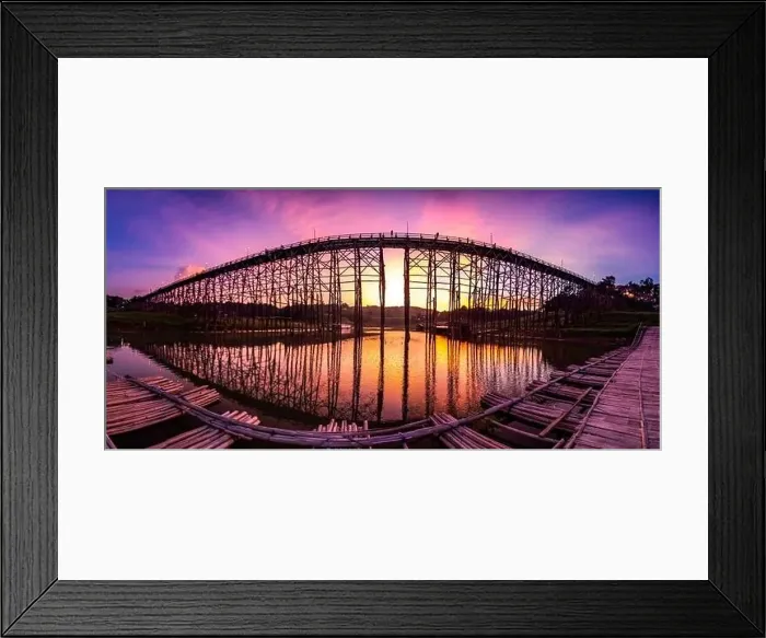 Framed Print : Mon Bridge, old wooden bridge at sunset in Sangkhlaburi, Kanchanaburi, Thailand, south east asia Framed Print : Mon Bridge, old wooden bridge at sunset in Sangkhlaburi, Kanchanaburi, Thailand, south east asia