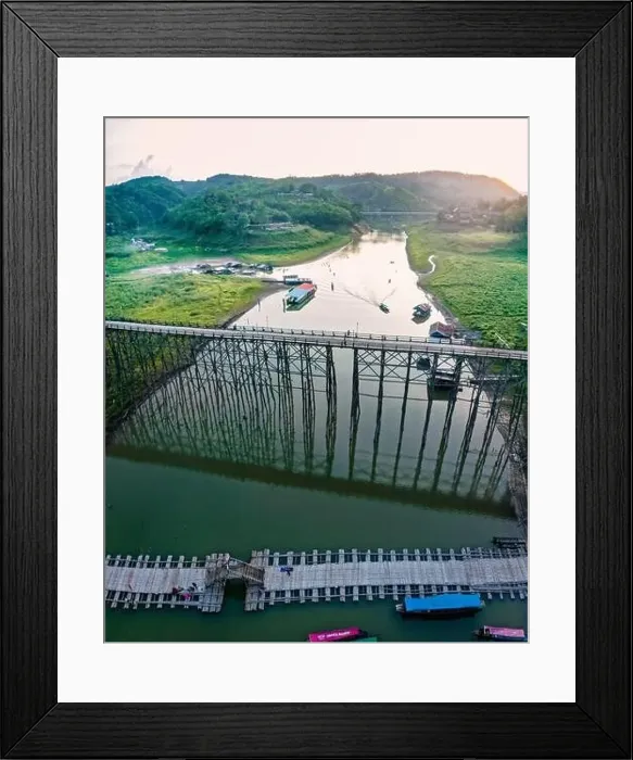 Framed Print : Mon Bridge, old wooden bridge at sunset in Sangkhlaburi, Kanchanaburi, Thailand, south east asia Framed Print : Mon Bridge, old wooden bridge at sunset in Sangkhlaburi, Kanchanaburi, Thailand, south east asia