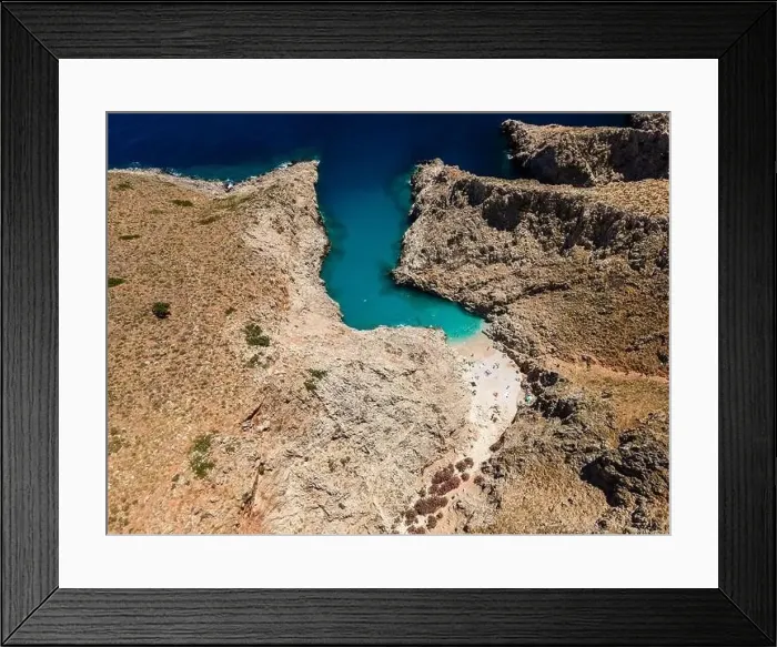 Framed Print : Aerial top view by drone of beach of Seitan Limania in bay with turquoise water and an unusual shape in Akrotiri, Crete Framed Print : Aerial top view by drone of beach of Seitan Limania in bay with turquoise water and an unusual shape in Akrotiri, Crete